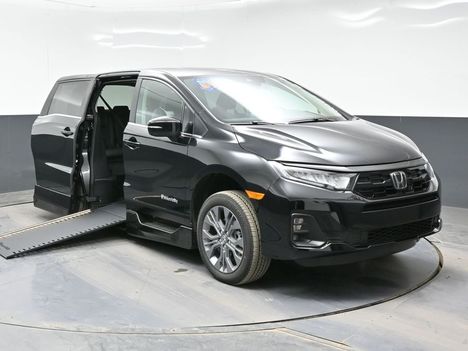 New Wheelchair Van For Sale: 2026 Honda Odyssey Touring Wheelchair Accessible Van For Sale with a BraunAbility XI on it. VIN: 5FNRL6H83TB043765