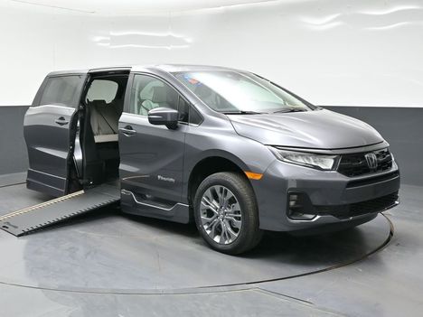 New Wheelchair Van For Sale: 2026 Honda Odyssey Elite Wheelchair Accessible Van For Sale with a BraunAbility XI on it. VIN: 5FNRL6H90TB045417