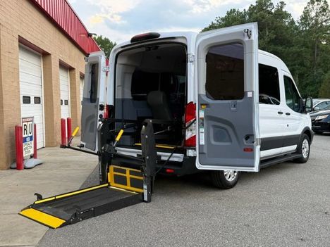 Used Wheelchair Van For Sale: 2018 Ford Transit Wagon XL w/Medium Roof w/Sliding Side Door Van Wheelchair Accessible Van For Sale with a  on it. VIN: 1FDZK1CM2JKB43216