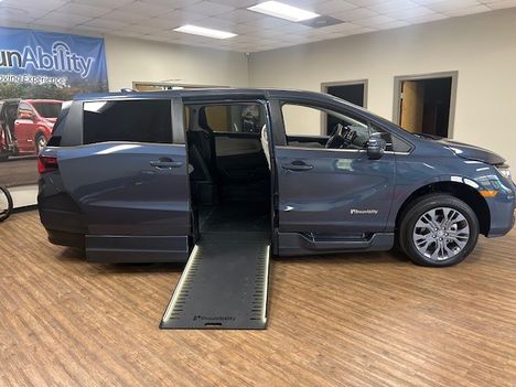 New Wheelchair Van For Sale: 2026 Honda Odyssey Touring Wheelchair Accessible Van For Sale with a  on it. VIN: 5FNRL6H89TB033838